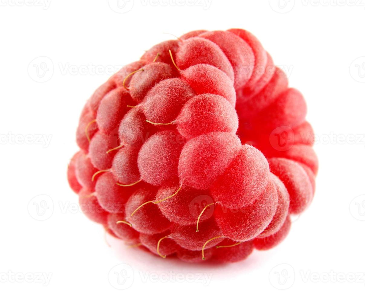 Ripe raspberry berry is isolated on a white background. Full clipping path. photo