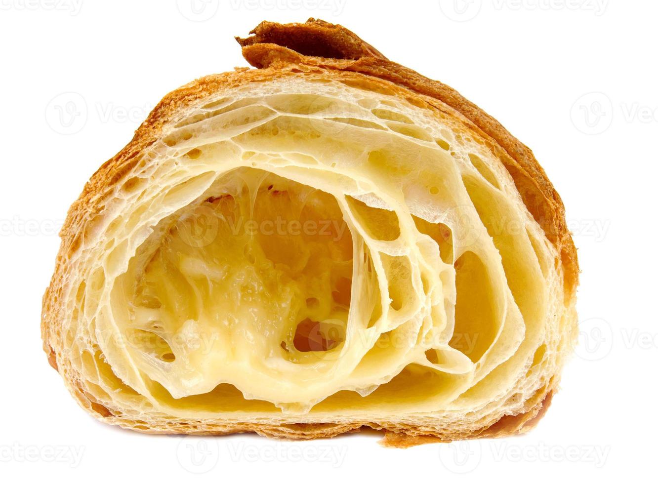 Croissant cutaway isolated on white background. Fresh bakery . photo