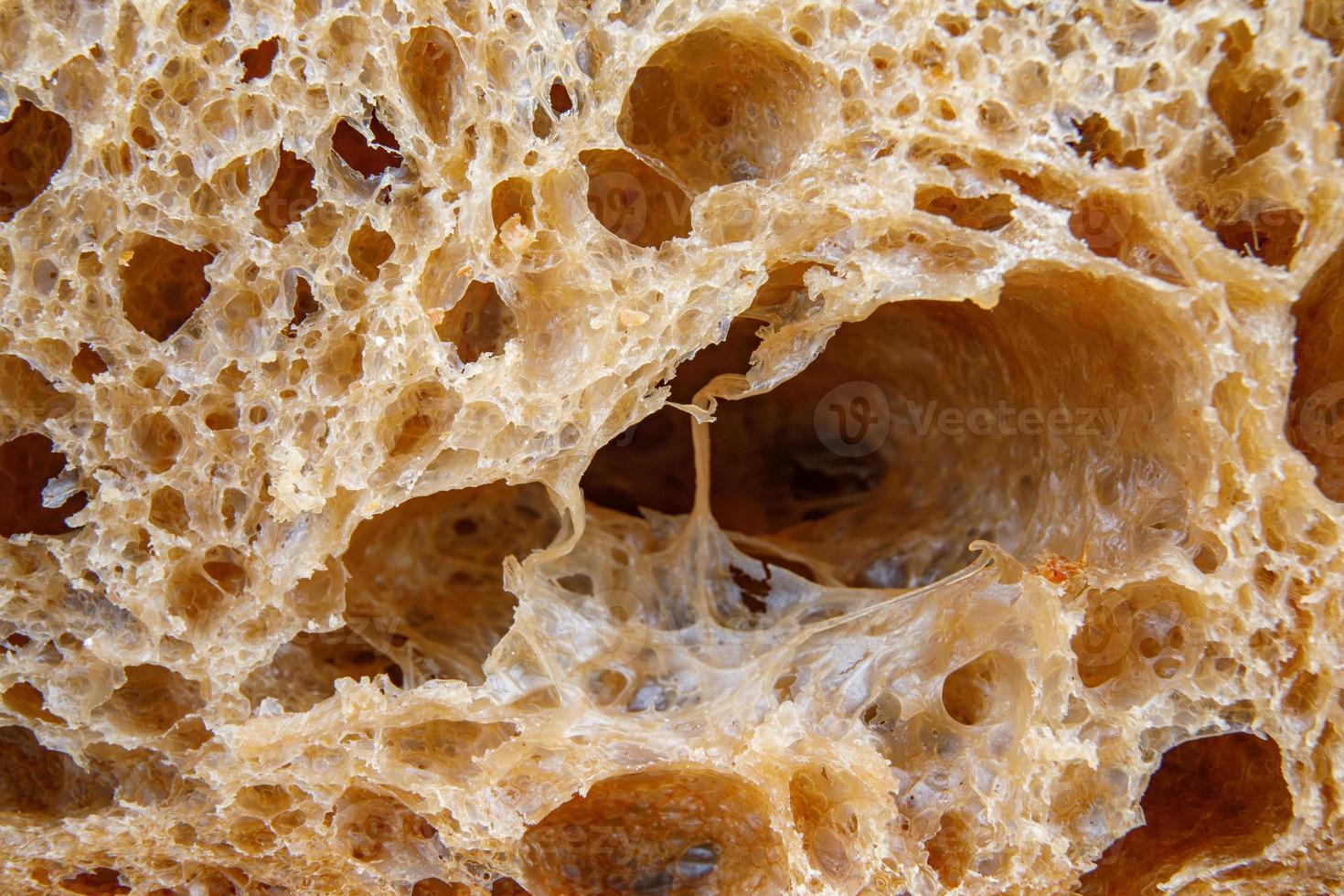The surface of the sliced bread close-up. Art bread. photo