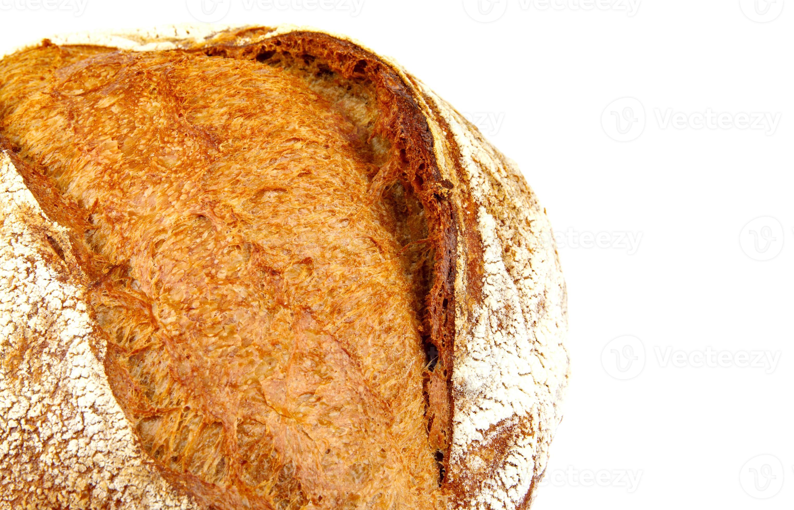 A fragment of a loaf of rustic bread. 10674542 Stock Photo at Vecteezy