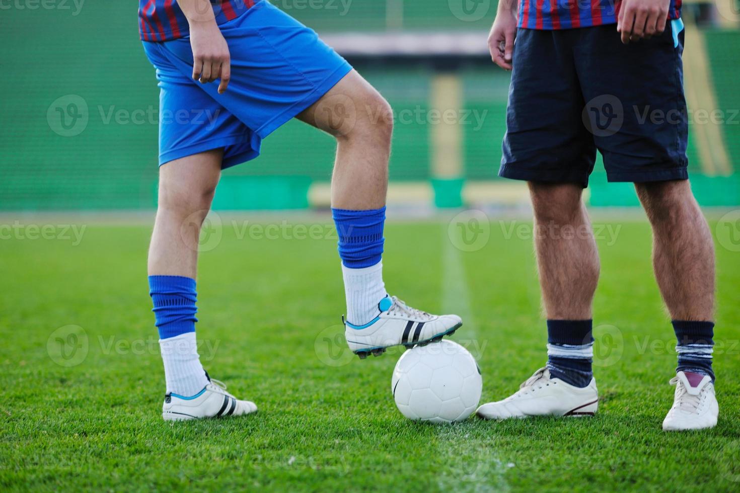 football players in competition for the ball photo