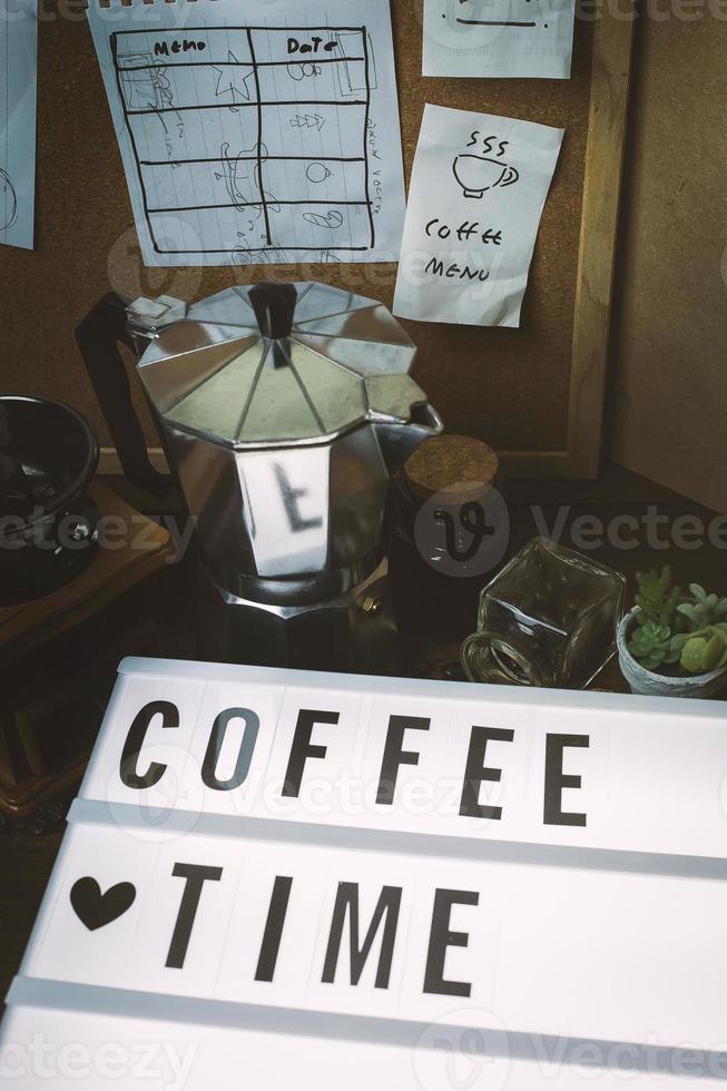vintage roaster coffee  on wood table. photo
