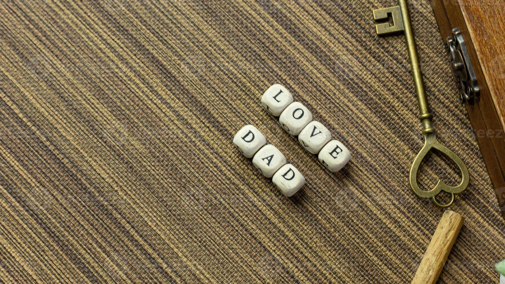 wooden text  for father day content close up image. photo