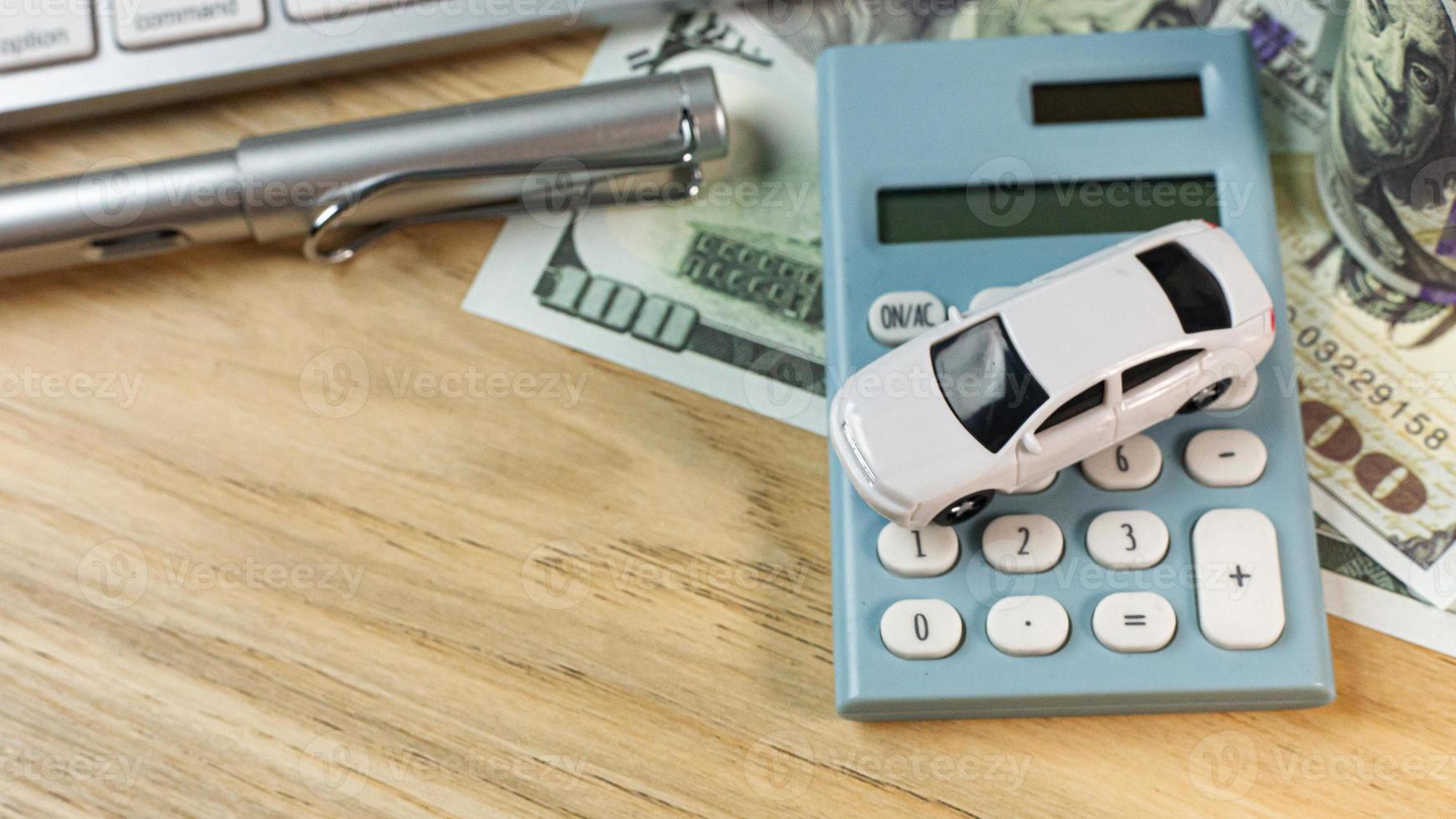 white  toy car  on work station table in office. photo