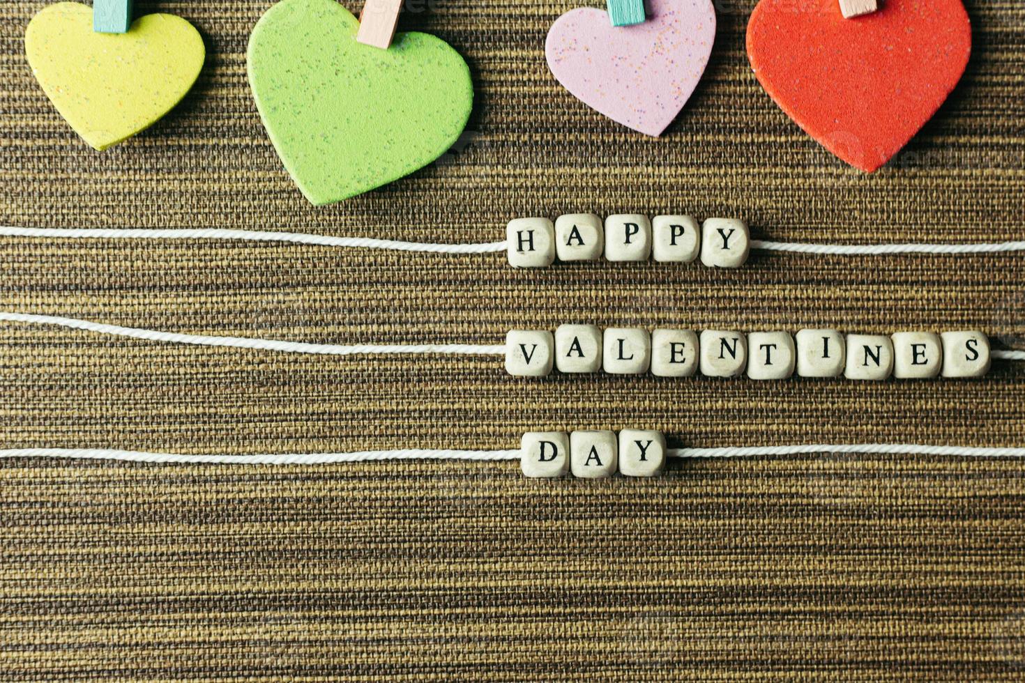 a text wood cubes image for valentines day content. photo