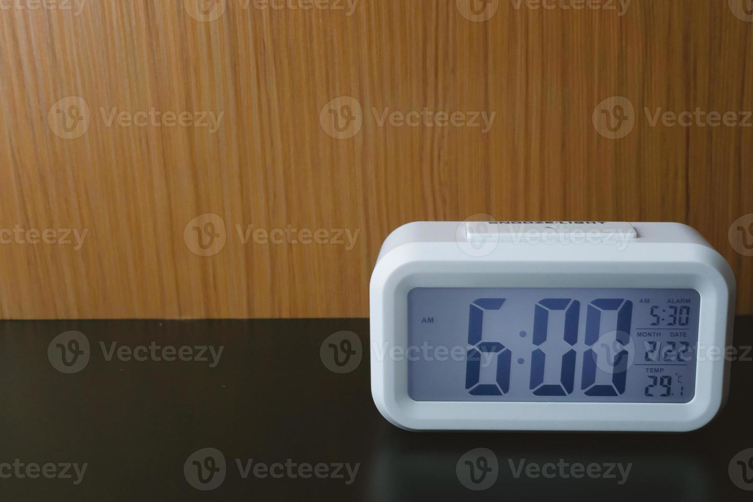 Digital alarm clock  6am close up image. photo