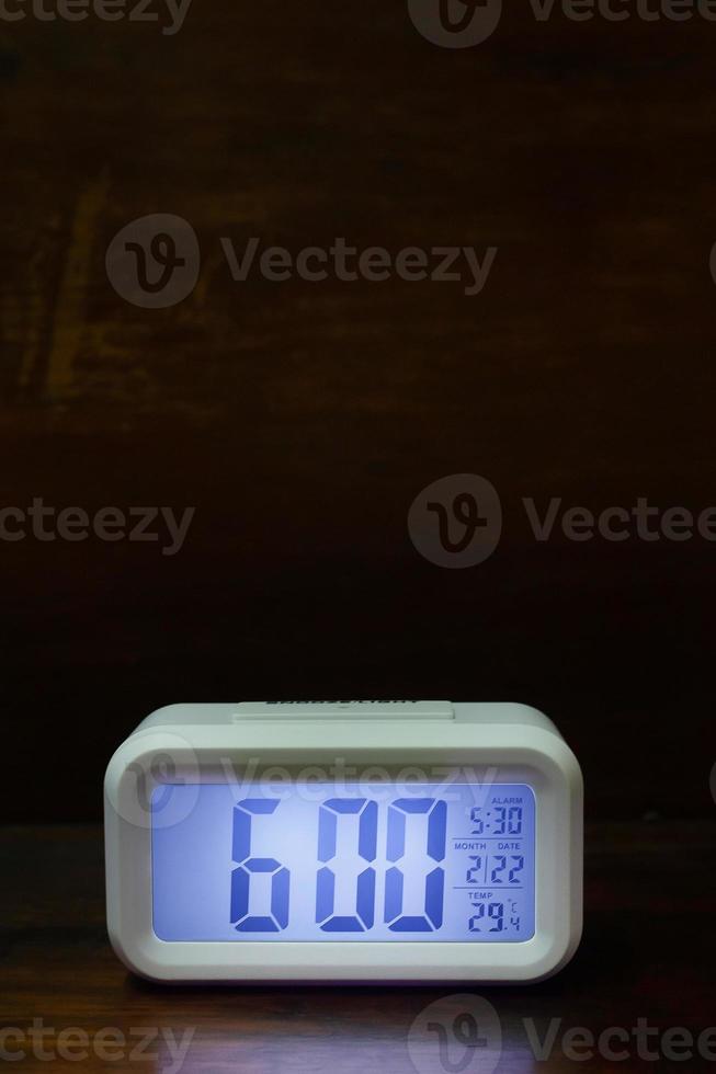 Digital alarm clock  6am close up image. photo