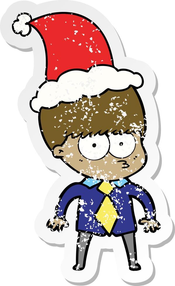 nervous distressed sticker cartoon of a boy wearing shirt and tie wearing santa hat vector