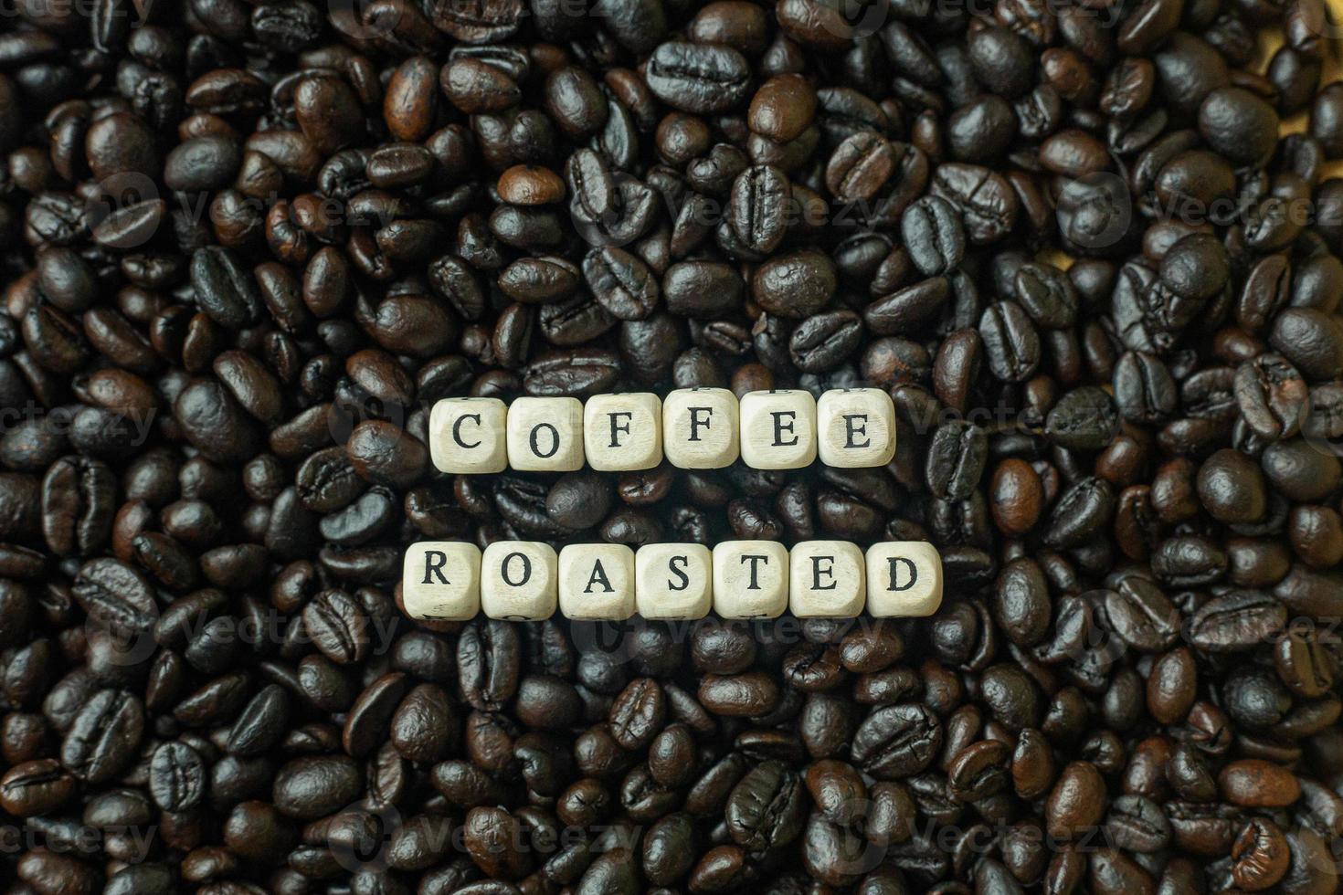 coffee roasted and text wood cube close up image. photo