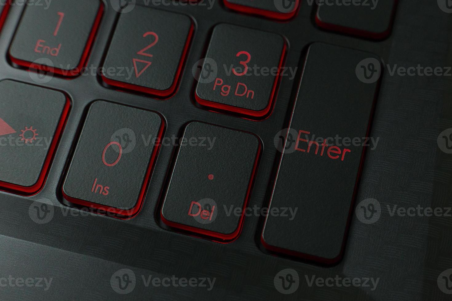 The enter button on keyboard laptop close up image. photo