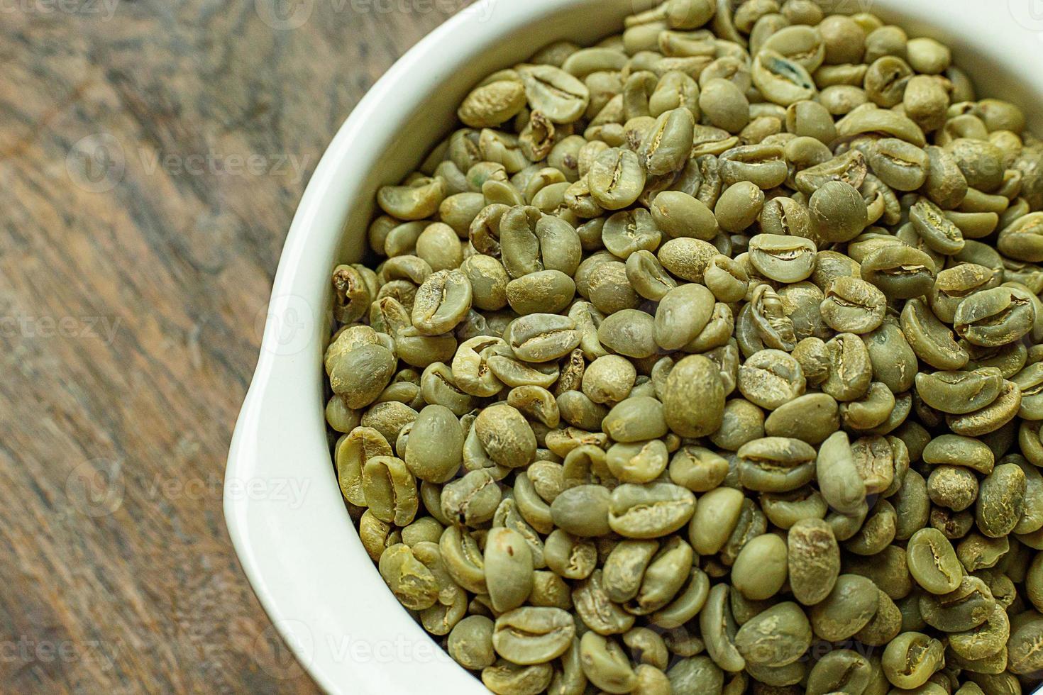 Imagen de primer plano crudo de café verde para el contenido de alimentos. foto