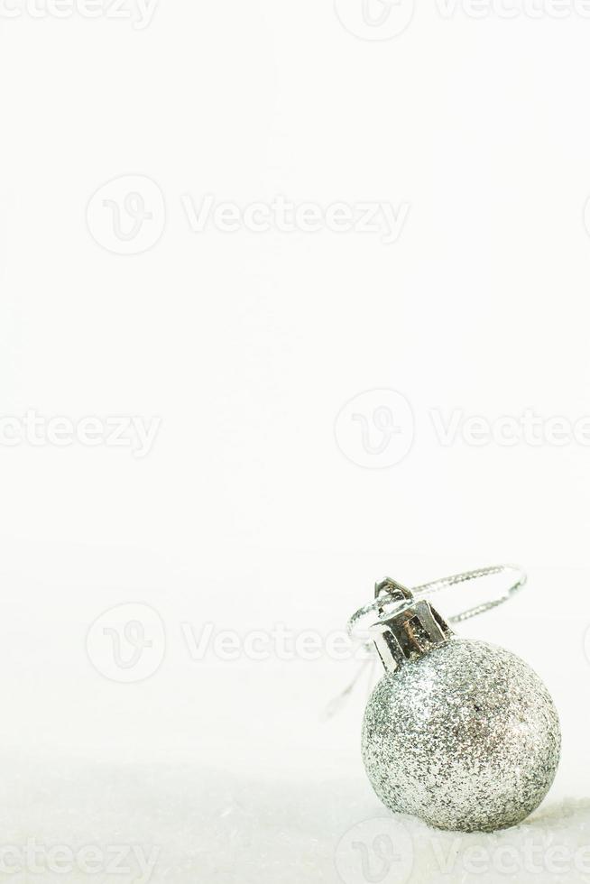 christmas ball on snow image background. photo