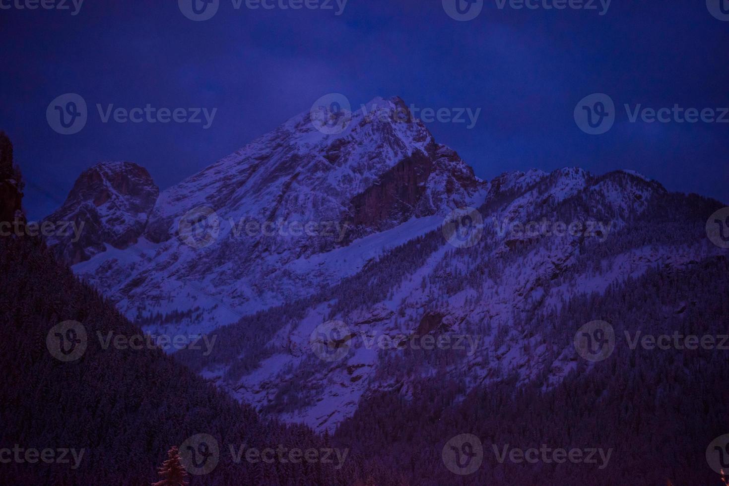 mountain village in alps  at night photo