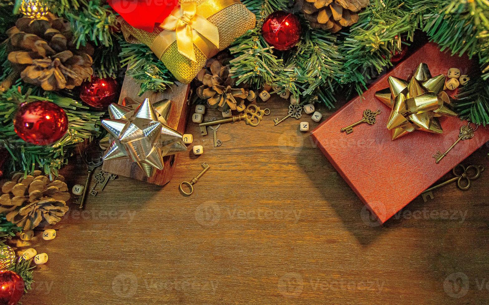 Christmas decorations on wood table for holiday content. photo