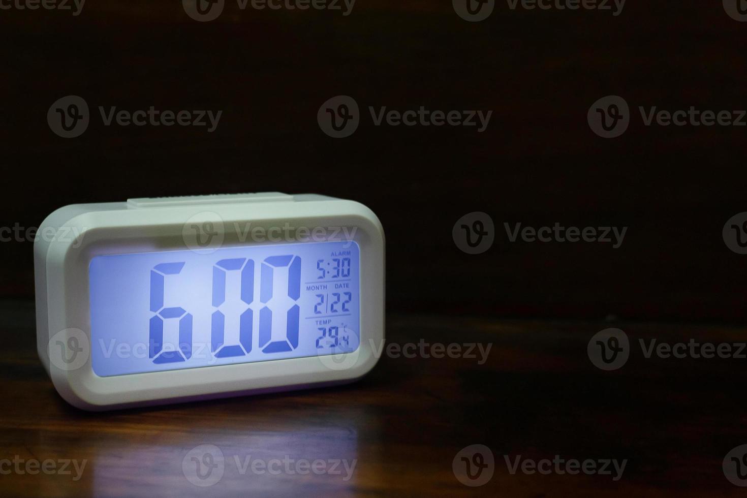 Digital alarm clock  6am close up image. photo
