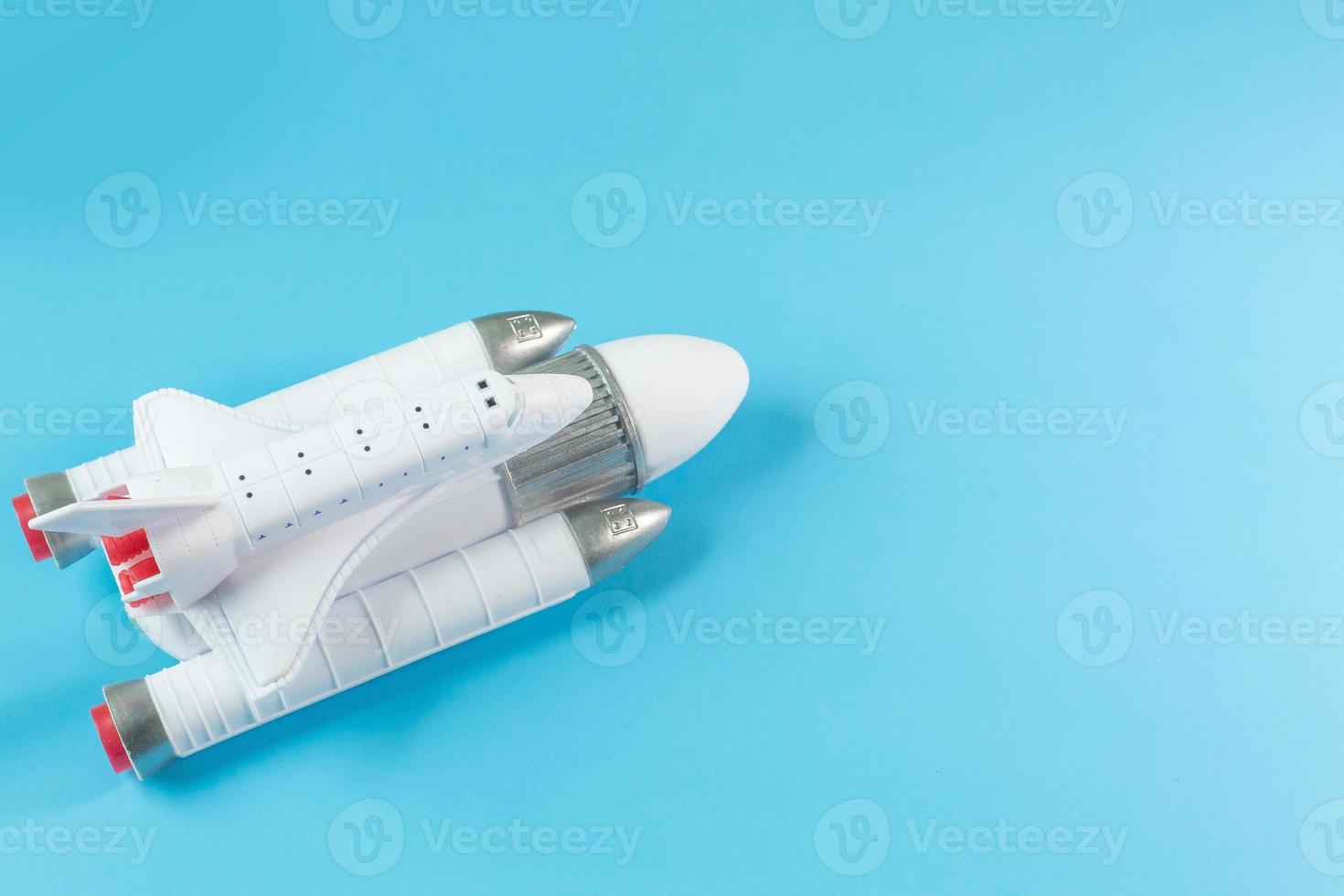 The  close up image space ship on blue background. photo