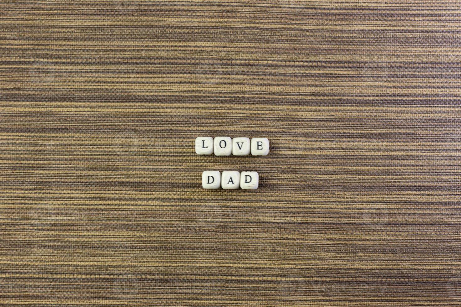 wooden text  for father day content close up image. photo