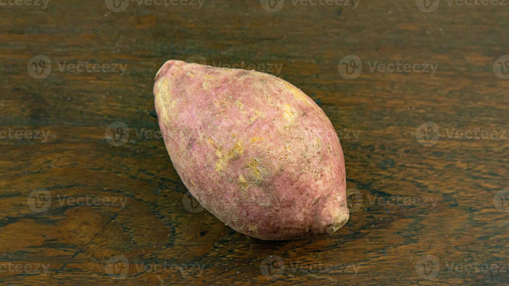 cassava on wood table for food concept. photo