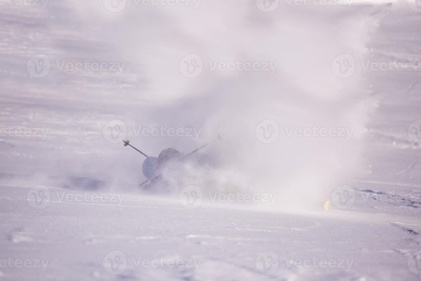 snowboarder crashes while carving down photo