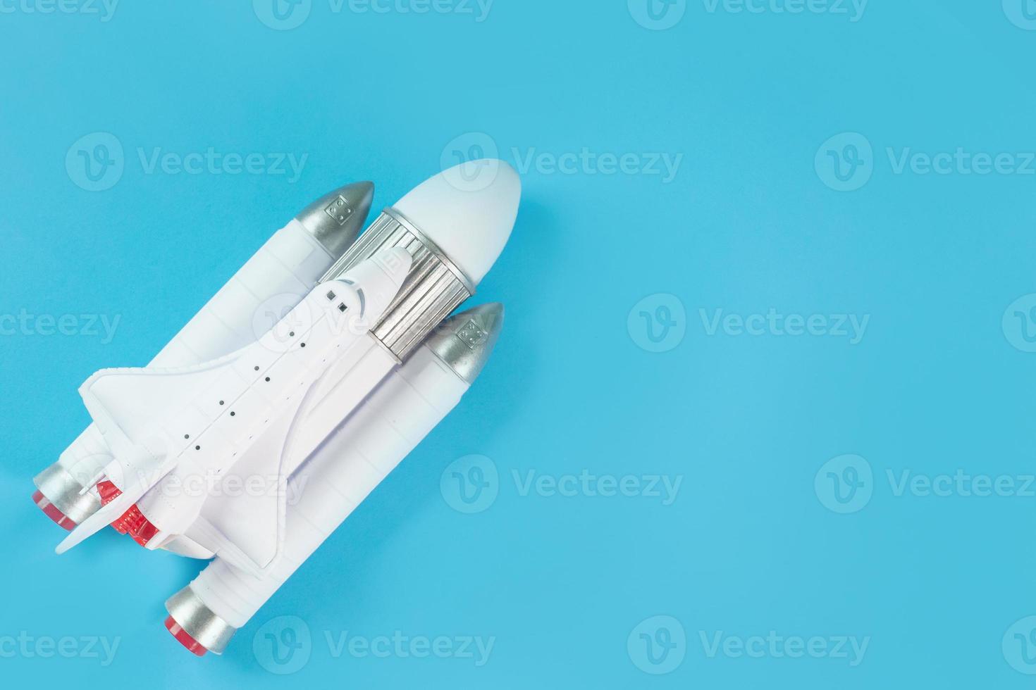 The  close up image space ship on blue background. photo