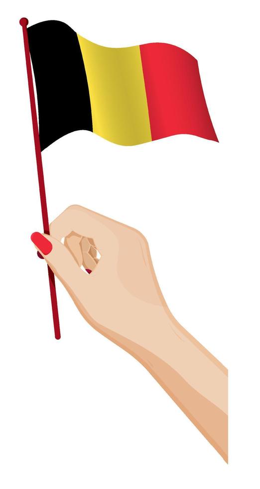 mano femenina sostiene suavemente una pequeña bandera de Bélgica. elemento de diseño de vacaciones. vector de dibujos animados sobre fondo blanco