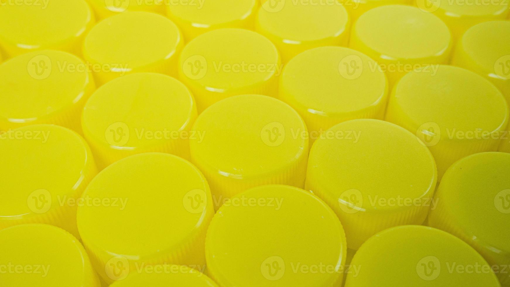 yellow Bottle  plastic cap for ego background. photo