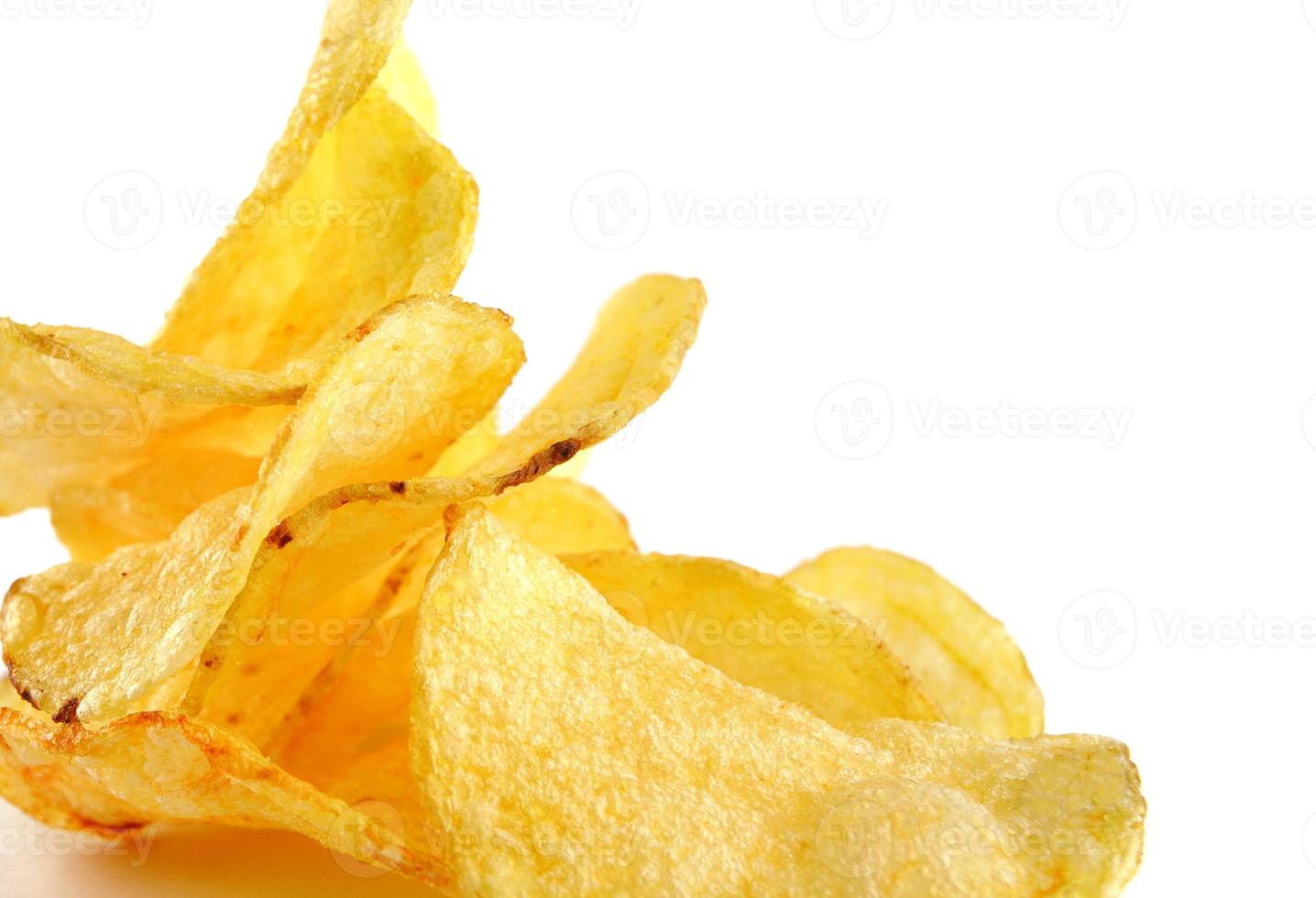 A bunch of potato chips on a white background. photo