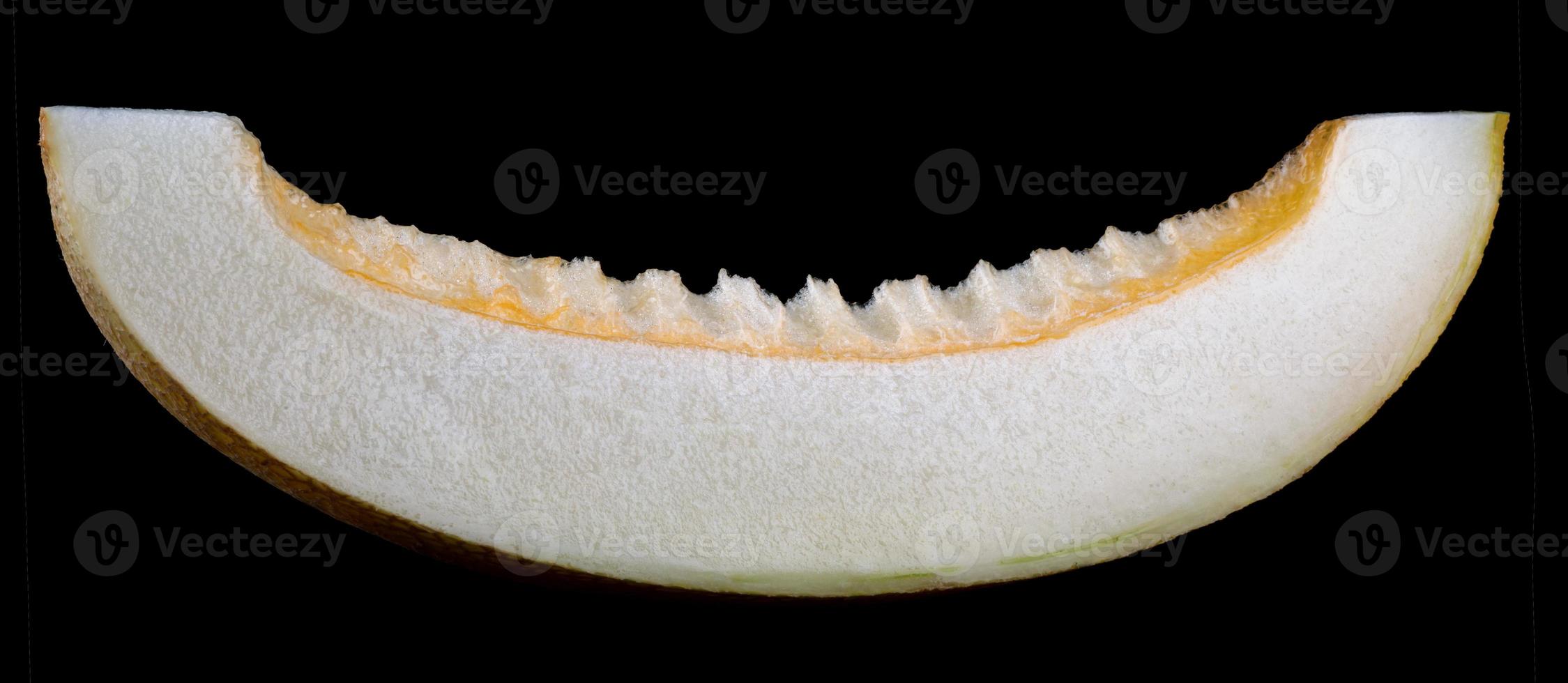 Beautiful slice of ripe melon on a wooden table. photo