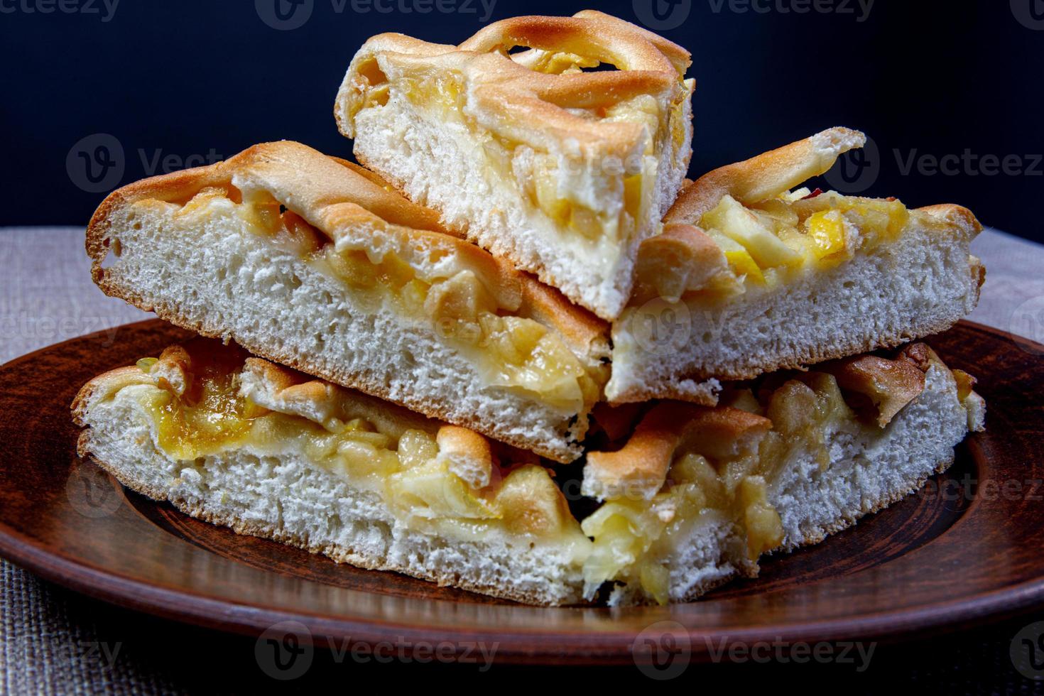 Beautifully stacked stack of apple pie pieces. photo