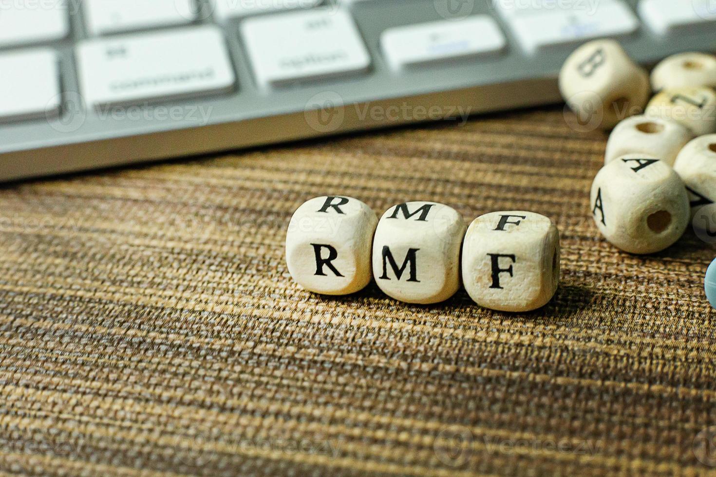 Text RMF on wooden cube for business content. photo