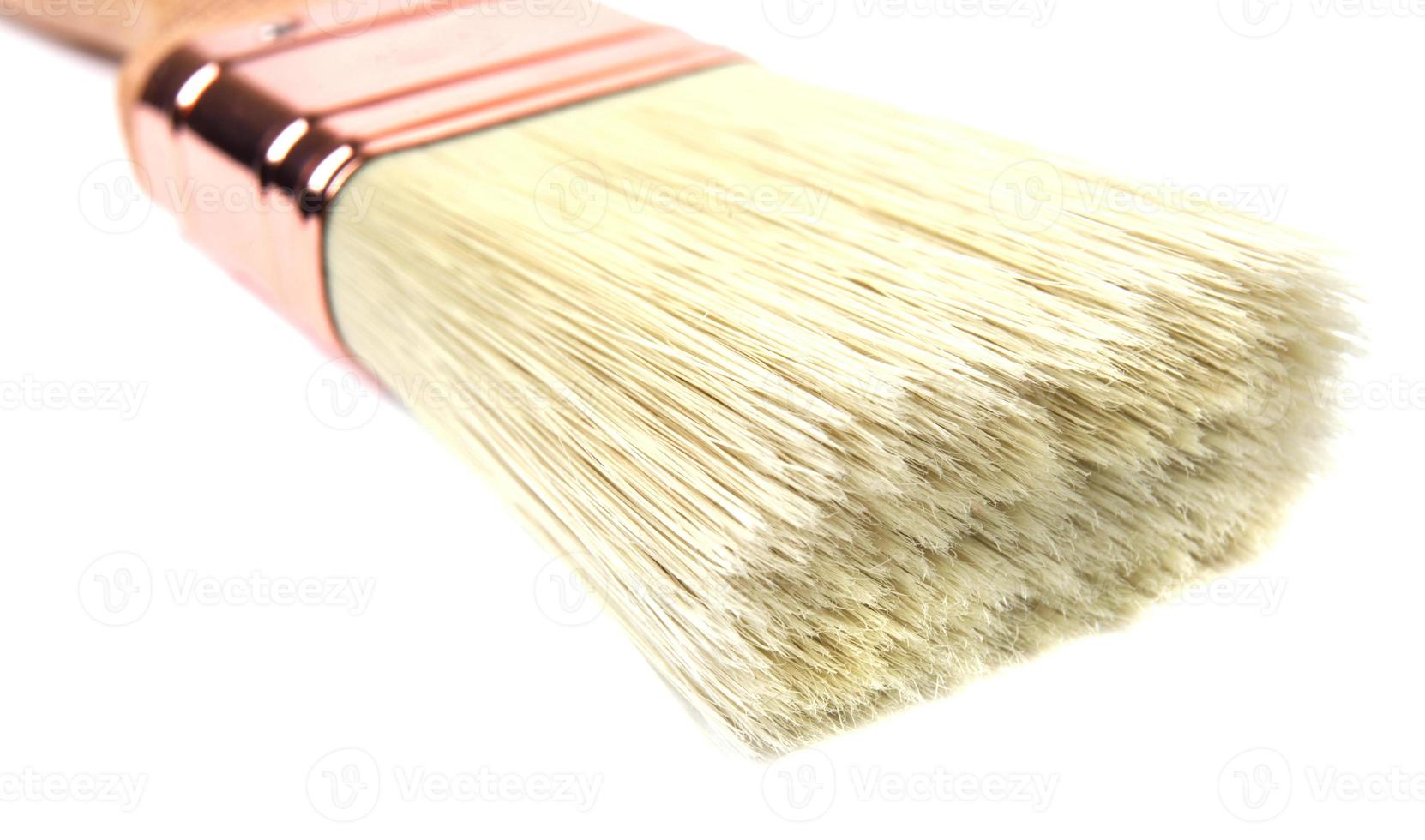 A new beautiful painting brush on a white background. photo