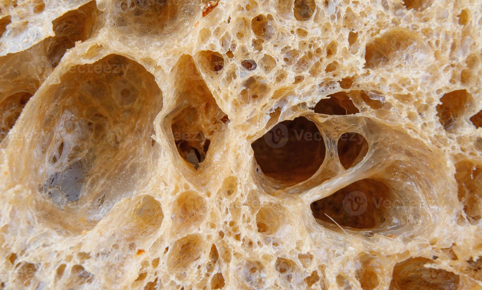 The surface of the sliced bread close-up. Art bread. photo