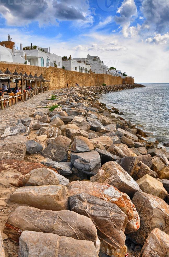 Stones on the beach of ancient Medina, Hammamet, Tunisia, Medite photo