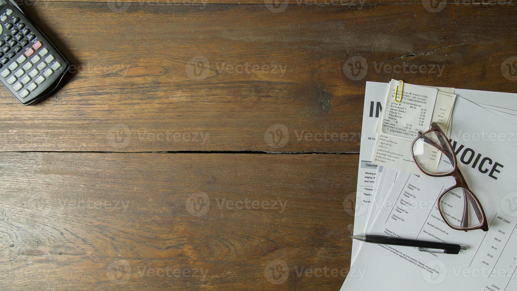 Business person working on wood table Flat lay background. photo