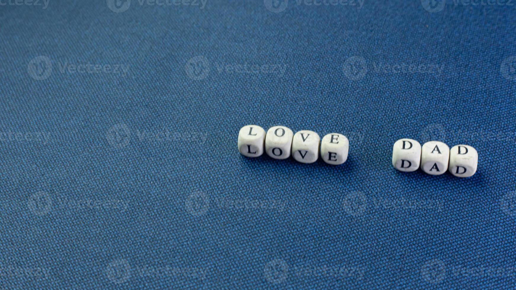 wooden text  for father day content close up image. photo