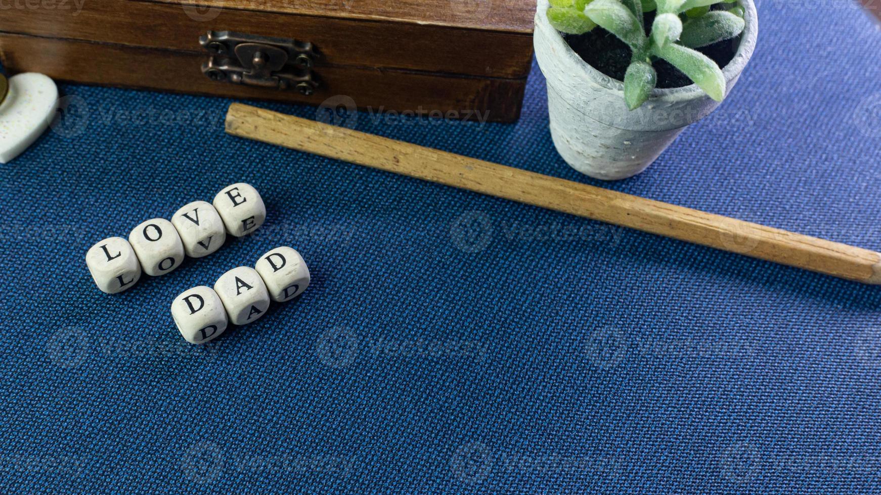 wooden text  for father day content close up image. photo