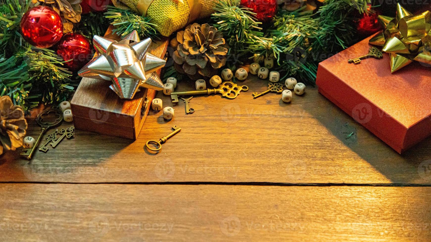Christmas decorations on wood table for holiday content. photo
