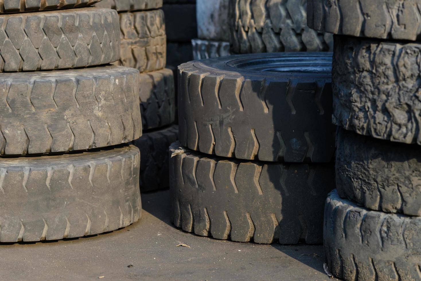 Column stack of old forklift tire photo