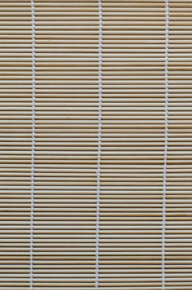 textura de cierre de estera de bambú foto