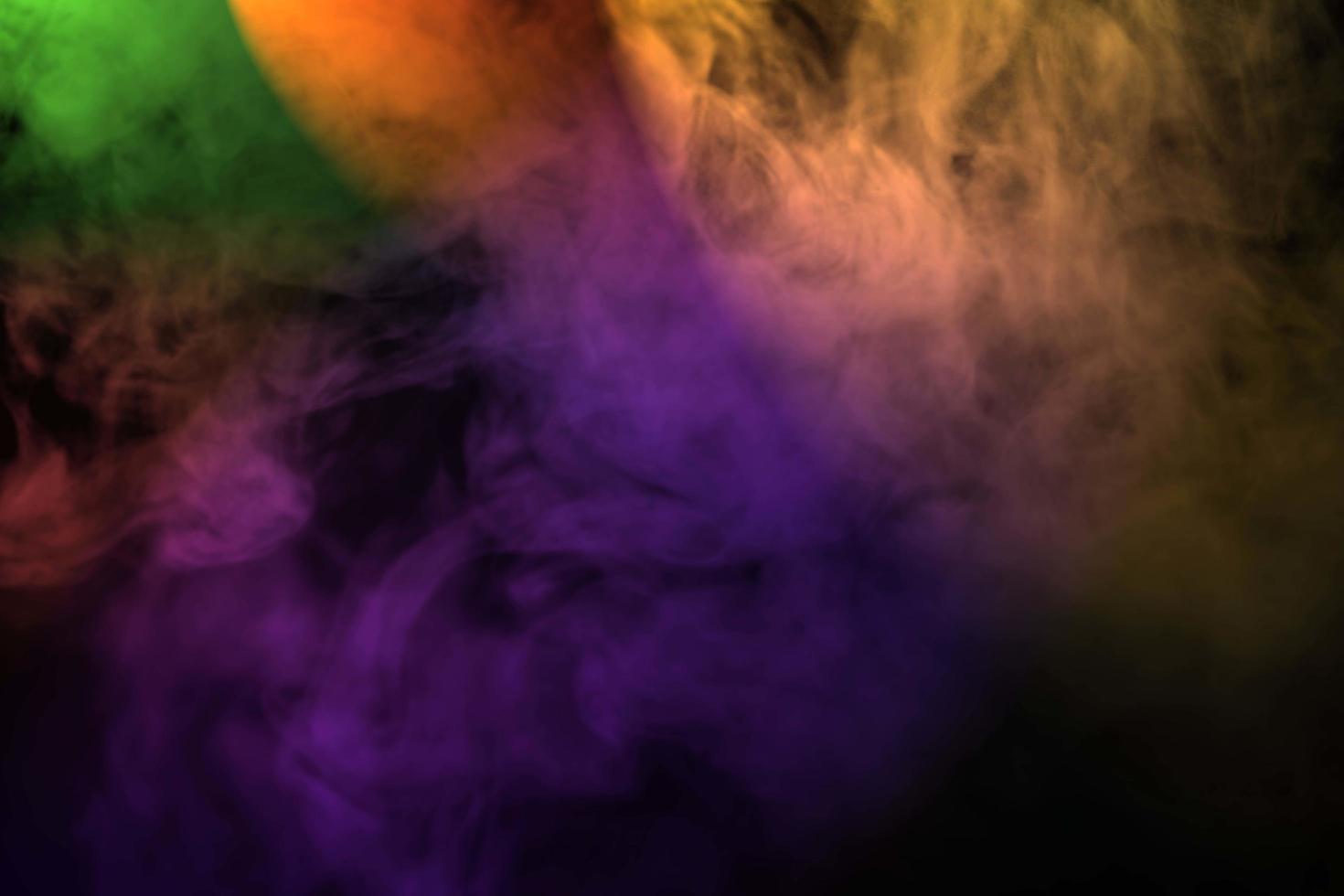 Abstract colorful smoke isolated on black background,Rainbow powder,Out of focus photo