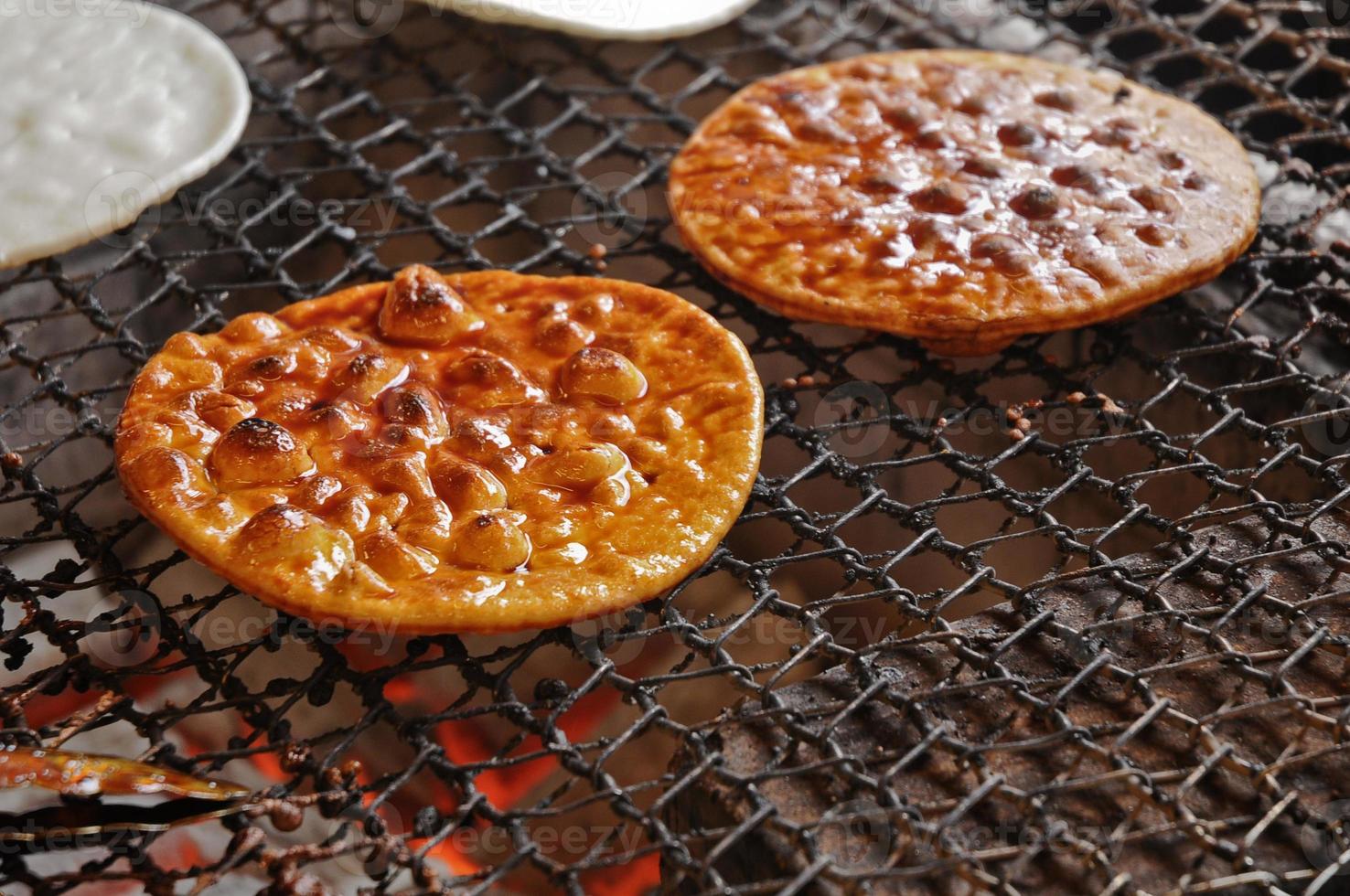 Japanese local homemade authentic salty soy rice cracker sembei crispy snack photo