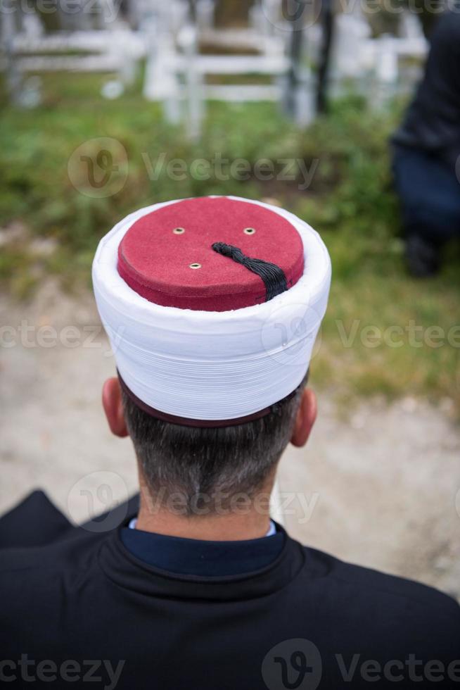 quran holy book reading by imam  on islamic funeral photo