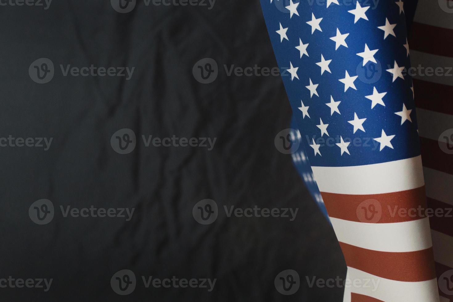 The Veterans Day  concept united states of America flag on black background. photo