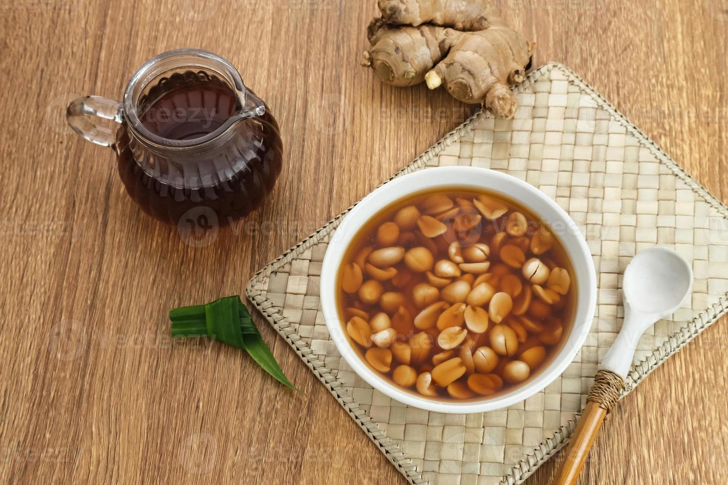 Wedang Kacang, a traditional Indonesian herbal drink, made from peanuts, ginger, palm sugar and pandan leaves photo