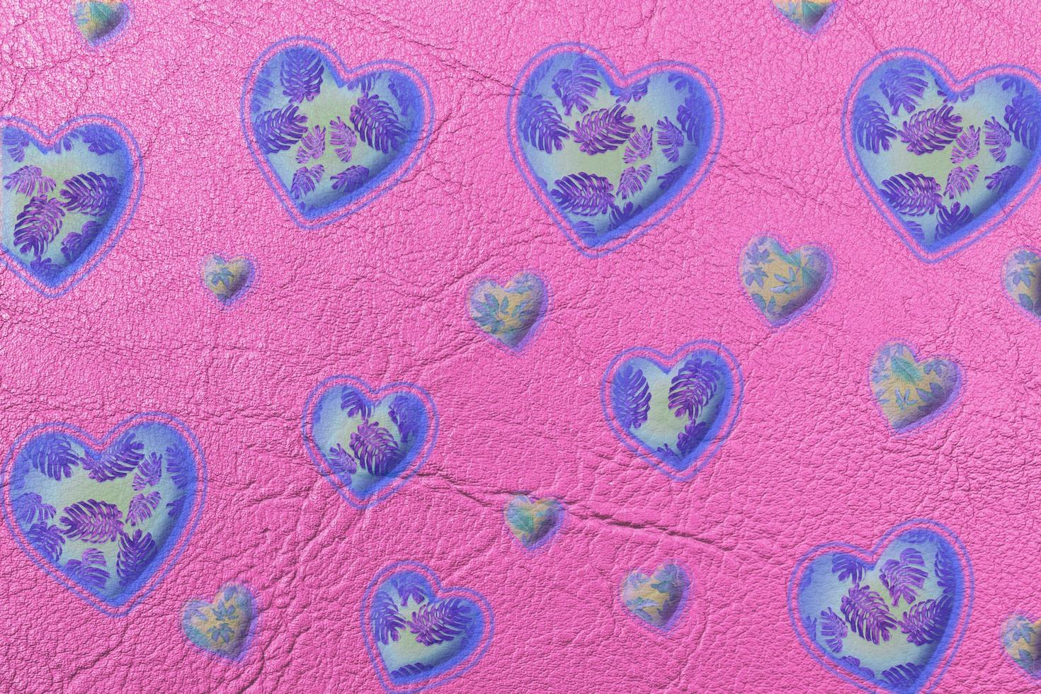 Abstract colorful  heart isolated on pink leather or paper texture with palm leaves pattern background,valentine day and love concept. photo