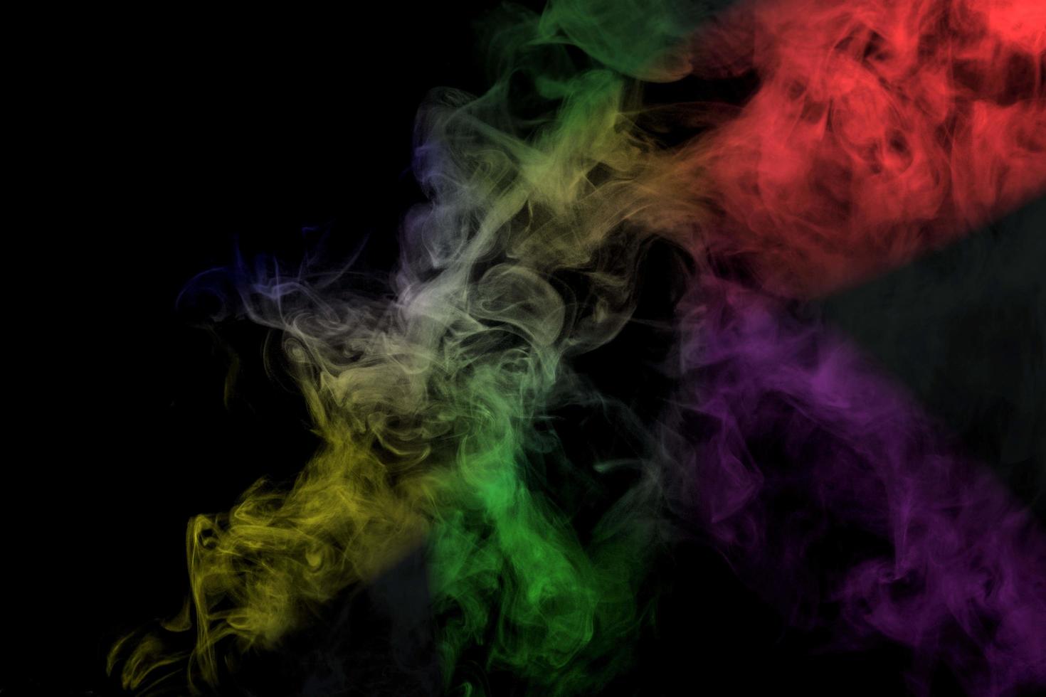 Abstract smoke isolated on black background,Rainbow powder photo