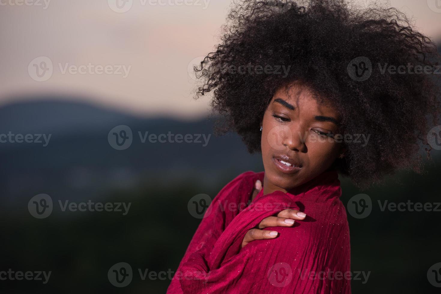 outdoor portrait of a black woman with a scarf photo