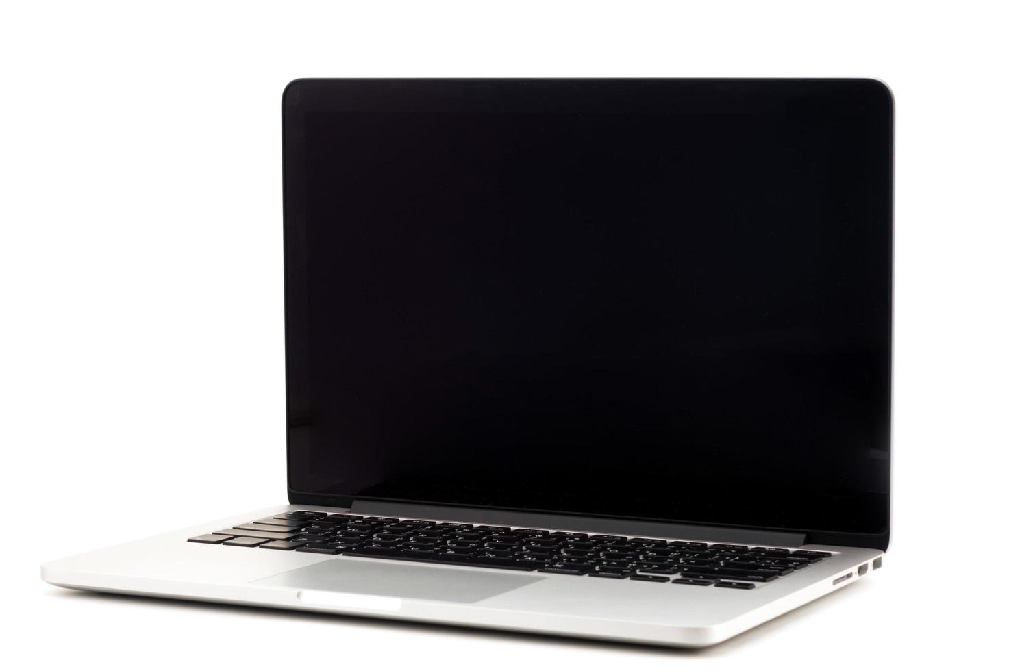 Laptop with blank white screen on white background photo
