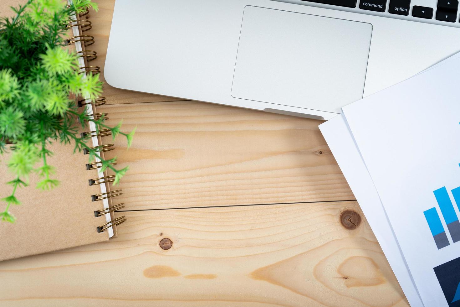 Wooden table with office supplies photo