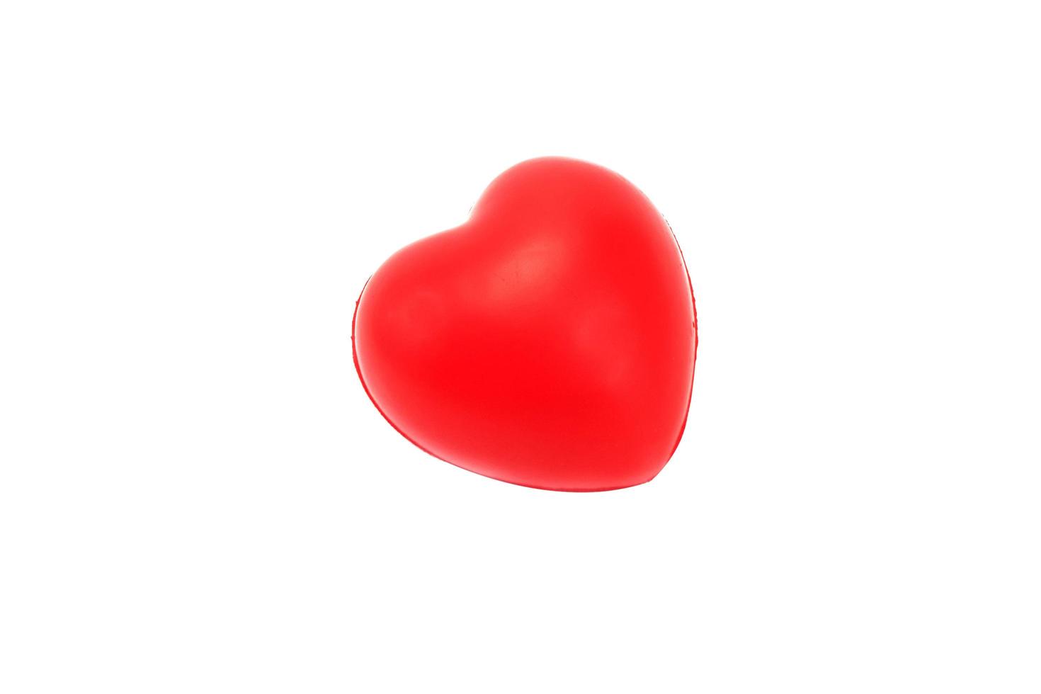 Red heart on white background. photo